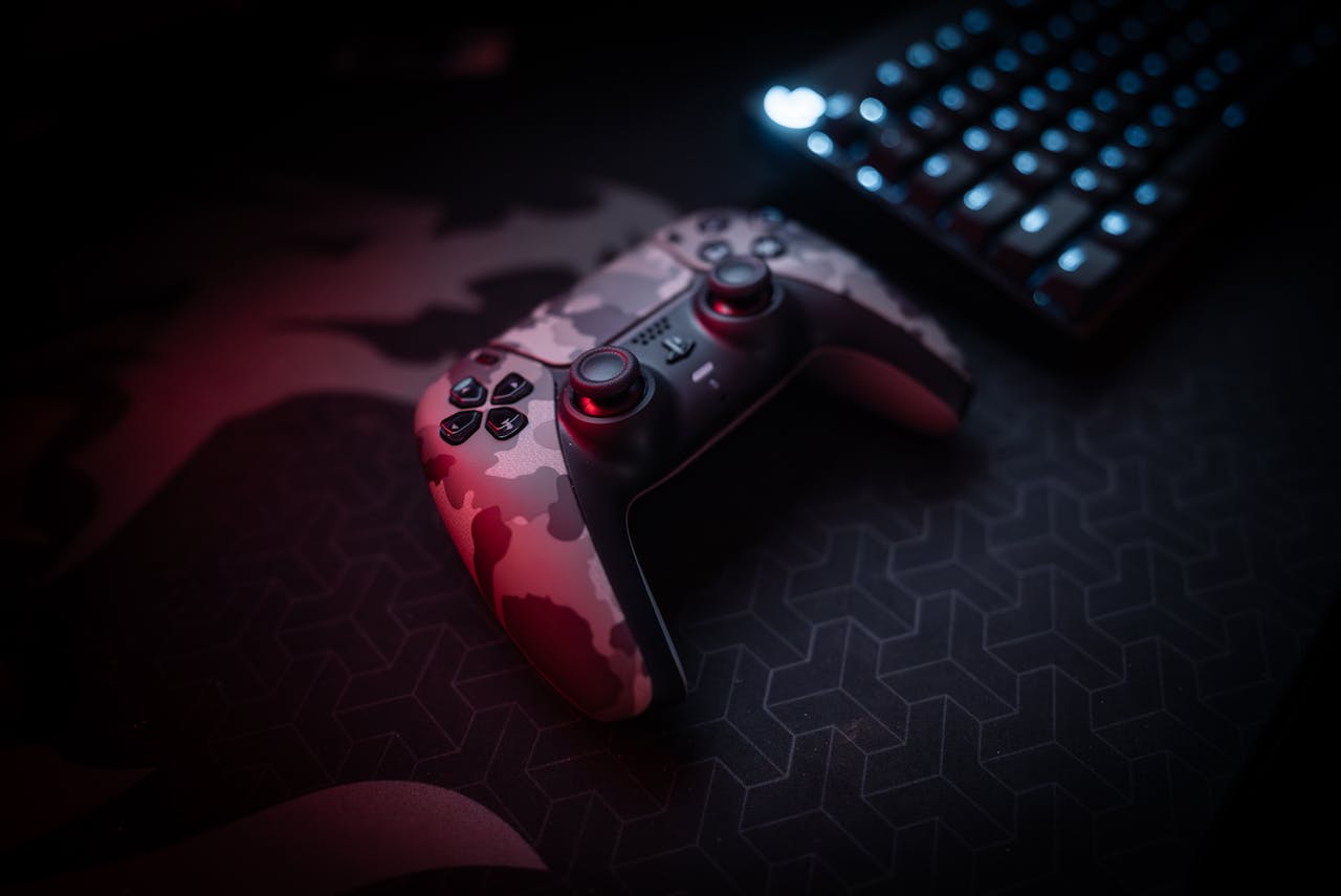 camouflage-gaming-controller-on-dark-desk-30393930